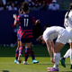 Rough outing for New Zealand’s Meikayla Moore (center, slumped over).